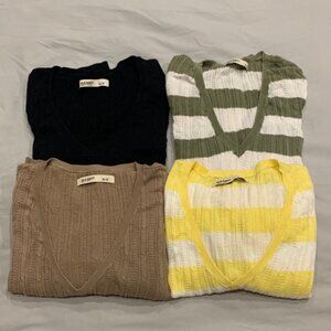 4 Old Navy women’s long sleeve see through shirts.